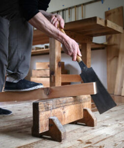 Andrew Hunter sawing