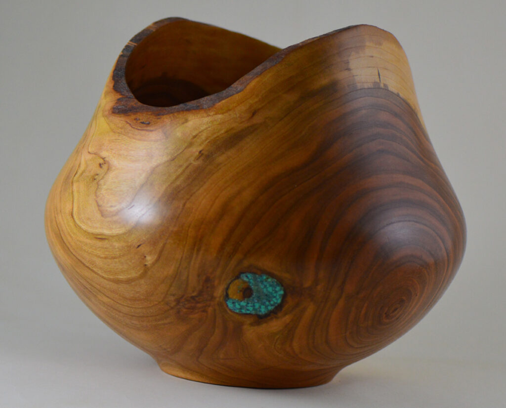 Turquoise inlay in wood bowl